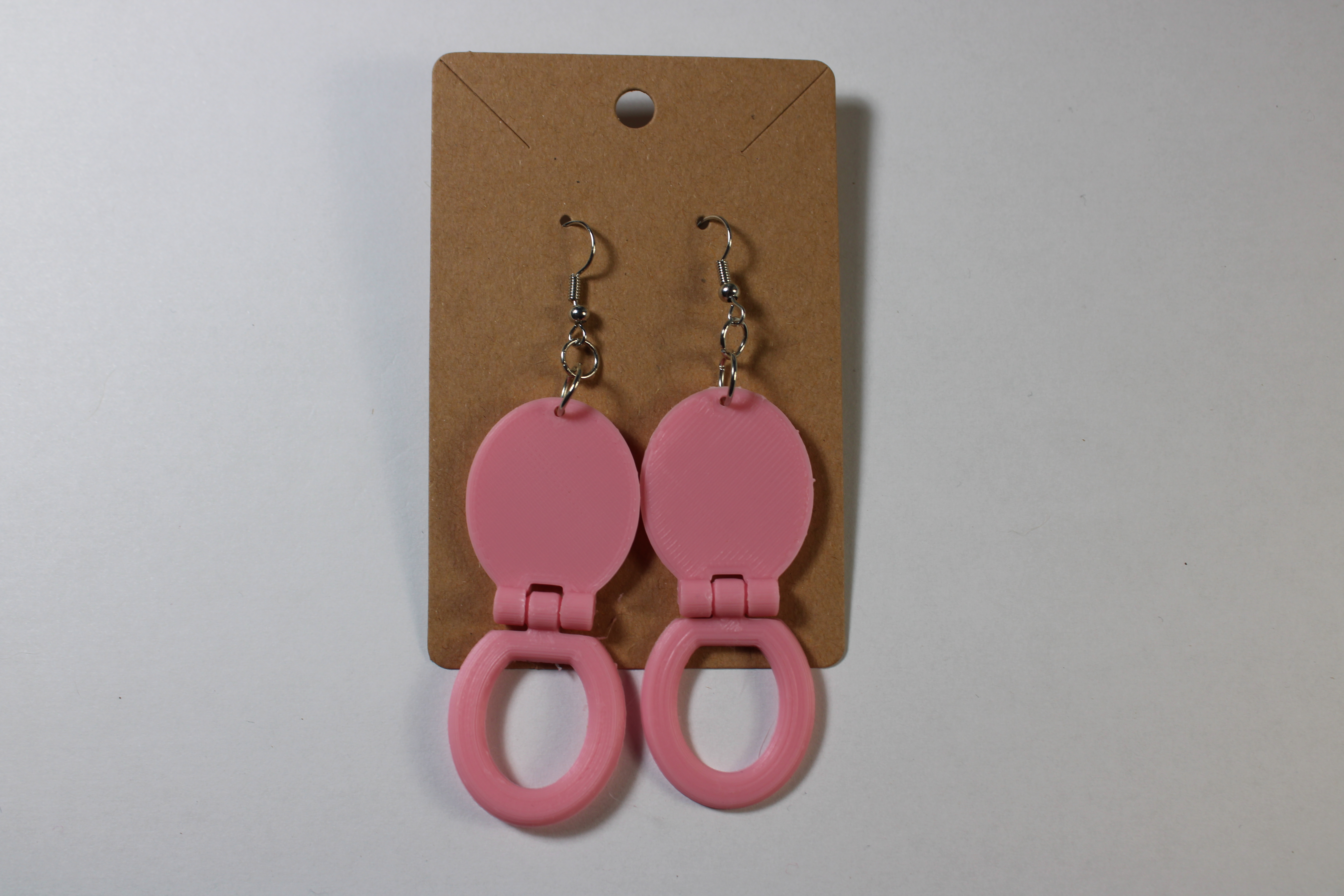 Two Pink Toilet Seat Earrings