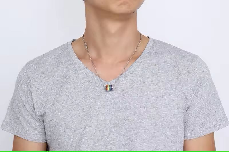 Pride Rainbow Cylinder Pendant Necklace with Chain on person