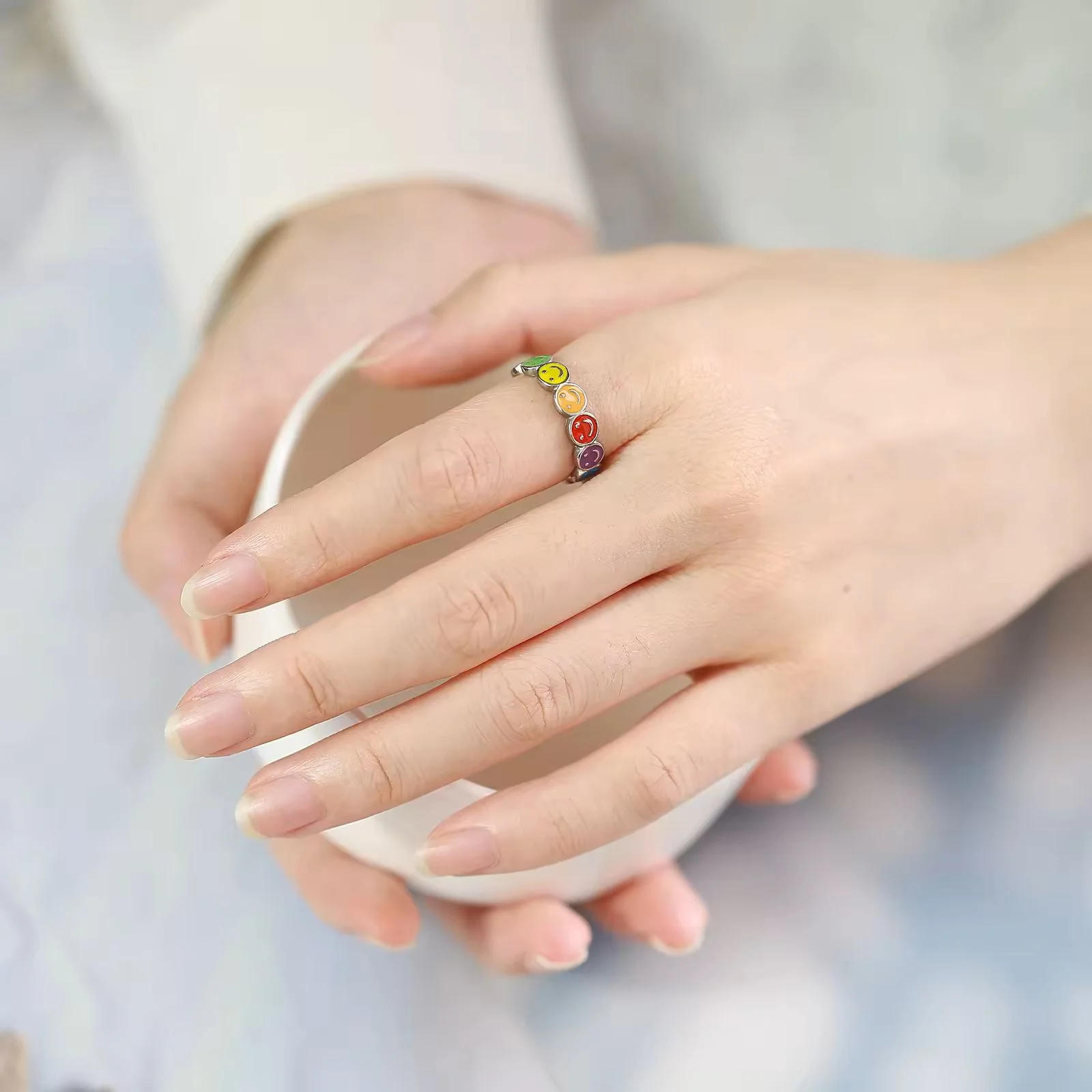 Smiling Rainbow Ring on hand