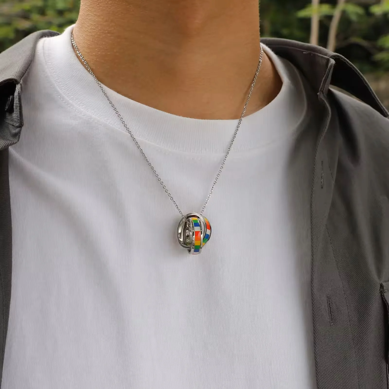 Double Ring Rainbow Pendant on person