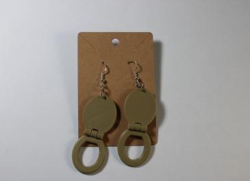 Two Wood Toilet Seat Earrings on display card